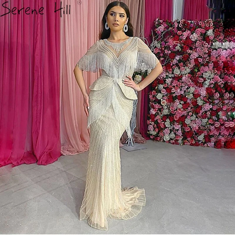 Evening dress with sequins-Dubai Beige Tassel Beading Mermaid Evening Dresses Design 2024 Half Sleeves Luxury Sexy Formal Dress Serene Hill LA70342